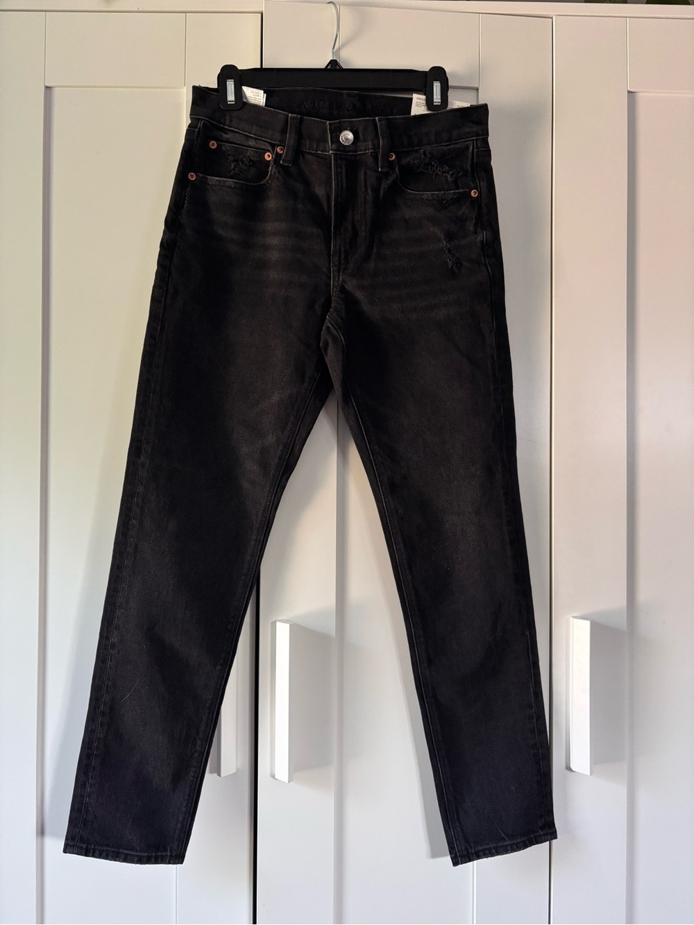 American Eagle ‘90s Skinny Stretch Black Jeans with Distressed Pockets